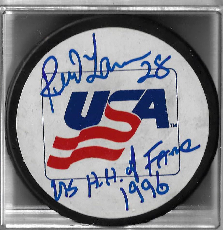 Reed Larson Autographed Team USA Puck JSA COA